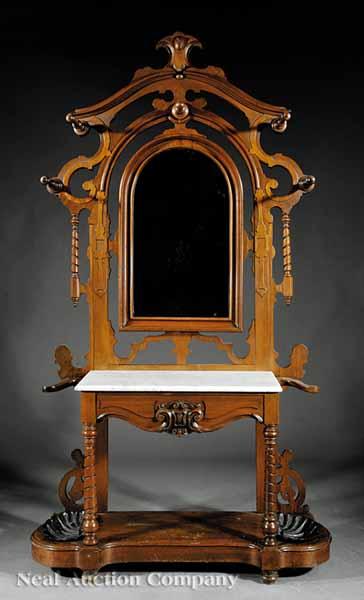 Appraisal: An American Renaissance Carved Walnut Hall Stand c pierced and