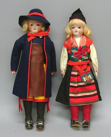 Appraisal: Pair of Swedish costume dolls Stationary blue eyes closed mouths