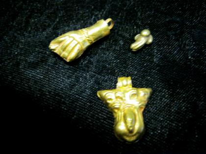 Appraisal: Group of ancient high karat yellow gold erotic charmsetruscan style