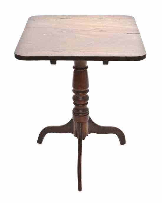 Appraisal: A Diminutive Tilt-Top Walnut Occasional Table having a rectangular top