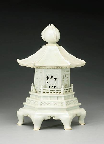 Appraisal: A white glazed porcelain two-section lantern Of hexagonal section in