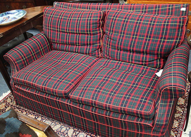 Appraisal: A BUTTON UPHOLSTERED TWO SEATER SETTEE with further cushions cm