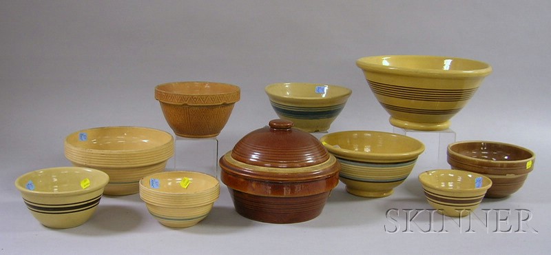 Appraisal: Nine Glazed Yellowware Kitchen Mixing Bowls and a Covered Dutch