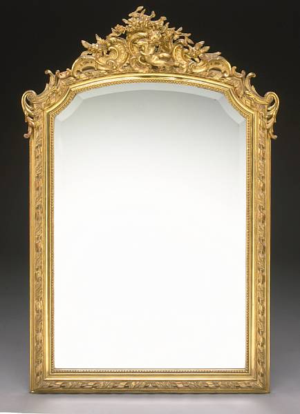 Appraisal: A Napoleon III carved giltwood and gesso mirror second half