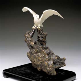 Appraisal: ANTIQUE JAPANESE IVORY OKIMONO Antique Japanese carved ivory bird with