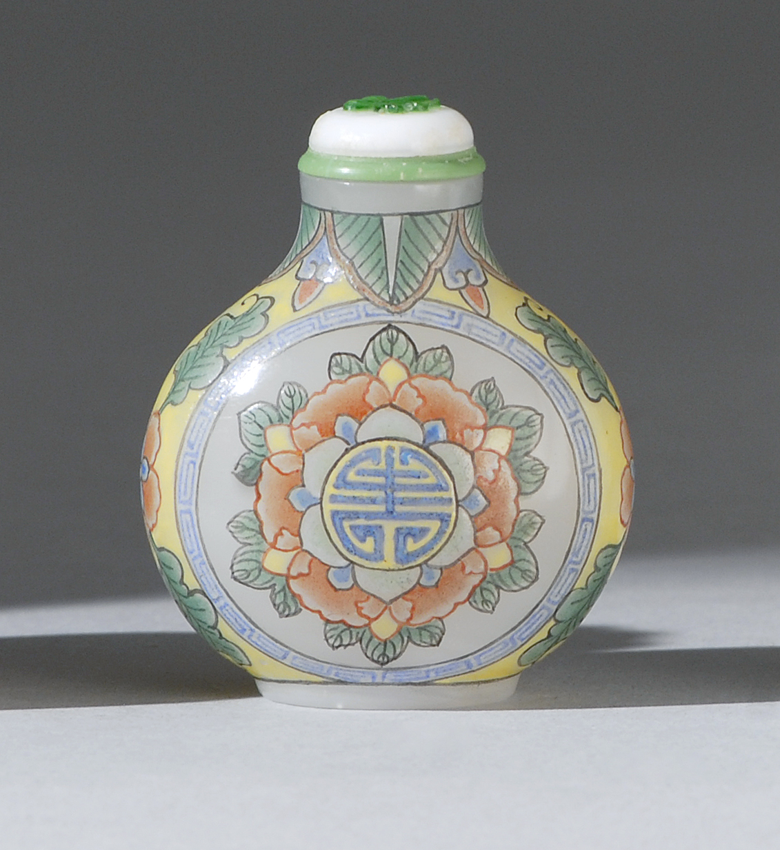 Appraisal: ENAMELED OPALESCENT GLASS SNUFF BOTTLE th CenturyIn pear shape with