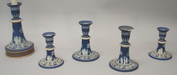 Appraisal: Lot of five Wedgwood candlesticks feature classical frieze motif on