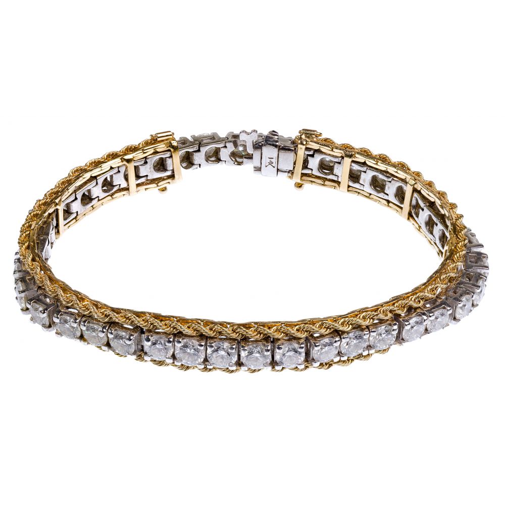 Appraisal: K WHITE AND YELLOW GOLD AND DIAMOND TENNIS BRACELETWhite gold