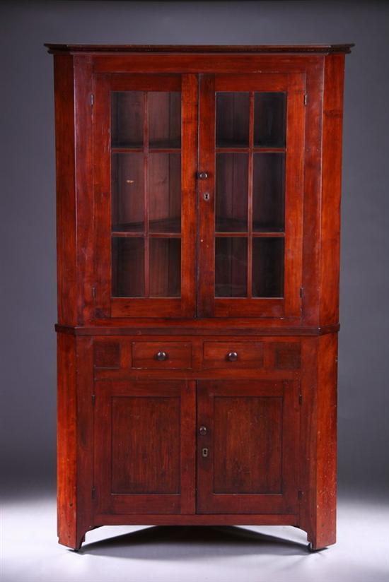 Appraisal: PENNSYLVANIA LATE FEDERAL MAHOGANY CORNER CABINET Early th century in