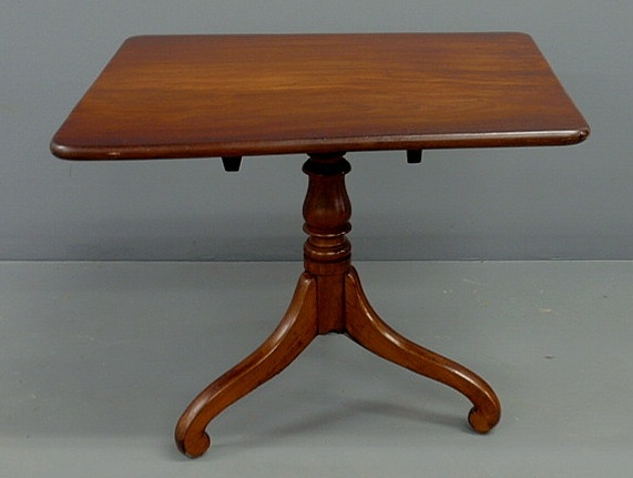 Appraisal: Empire mahogany low table with a tilt top h top