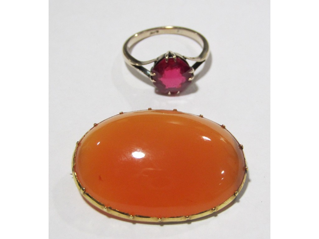 Appraisal: Lot comprising a gold mounted cornelian oval brooch and an