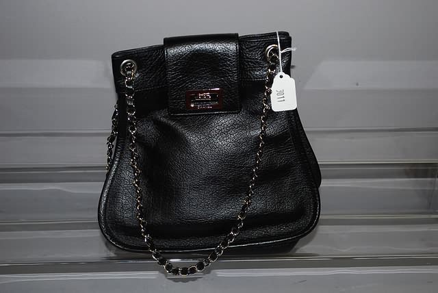 Appraisal: Chanel black handbag with silver and black chain Good condition