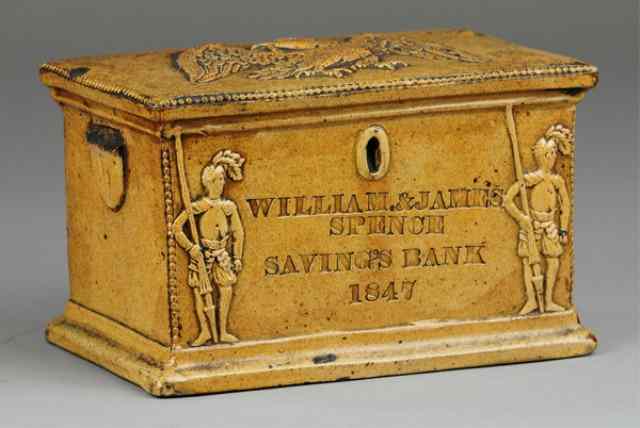 Appraisal: WILLIAM JAMES SPENCE SAVINGS POTTERY STILL BANK deep reliefs of