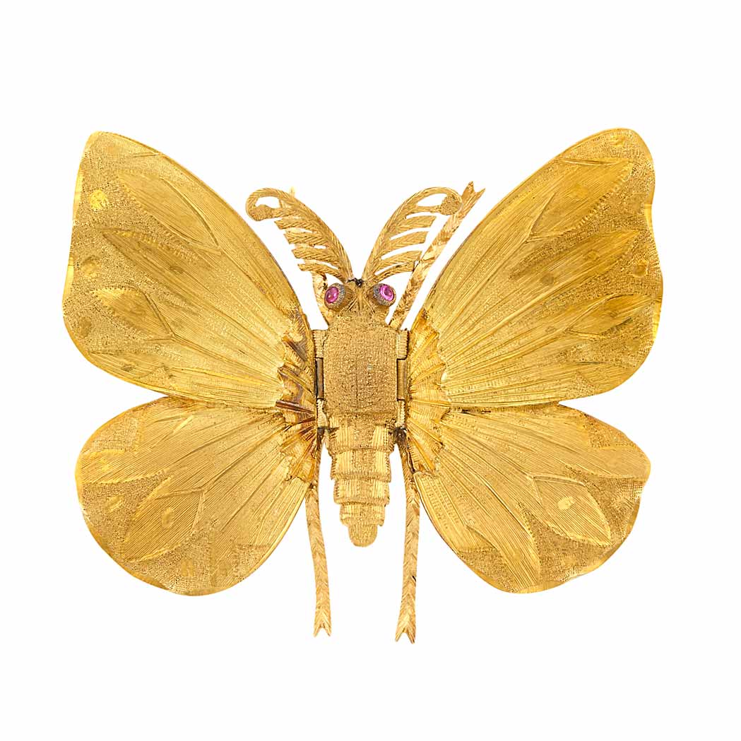 Appraisal: Gold Butterfly Scarf Clip Mario Buccellati kt round cabochon pink