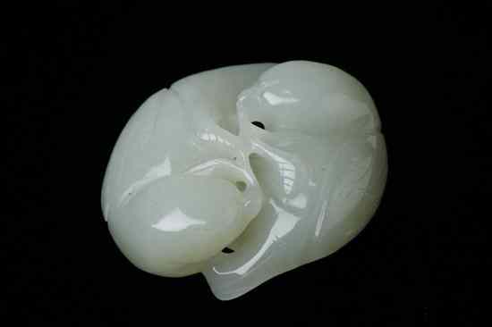 Appraisal: CHINESE LIGHT CELADON JADE FIGURES OF TWO BIRDS - in