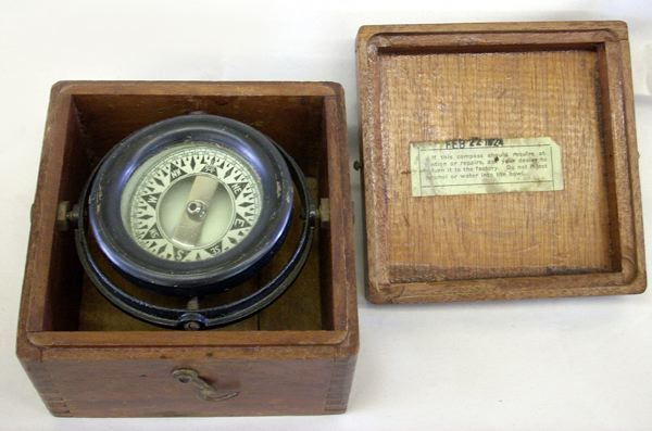 Appraisal: George V Square-Cased and Gymballed Cast-Iron Enamel and Glass Compass