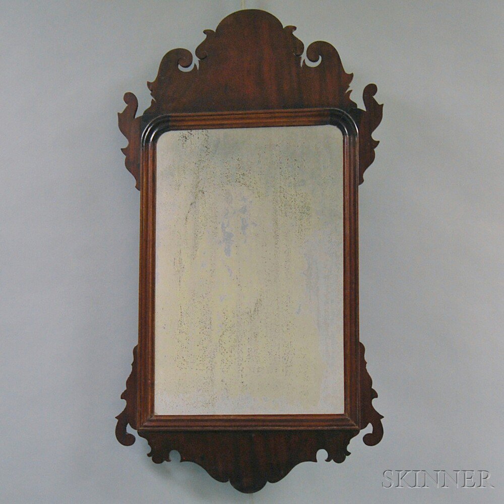 Appraisal: Chippendale Mahogany Mirror th century the scrolled frame with molded