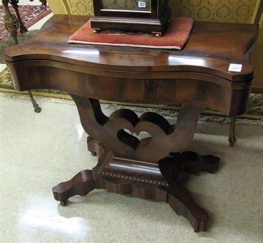 Appraisal: MAHOGANY GAME TABLE Late Classicism Pillar Scroll design American c