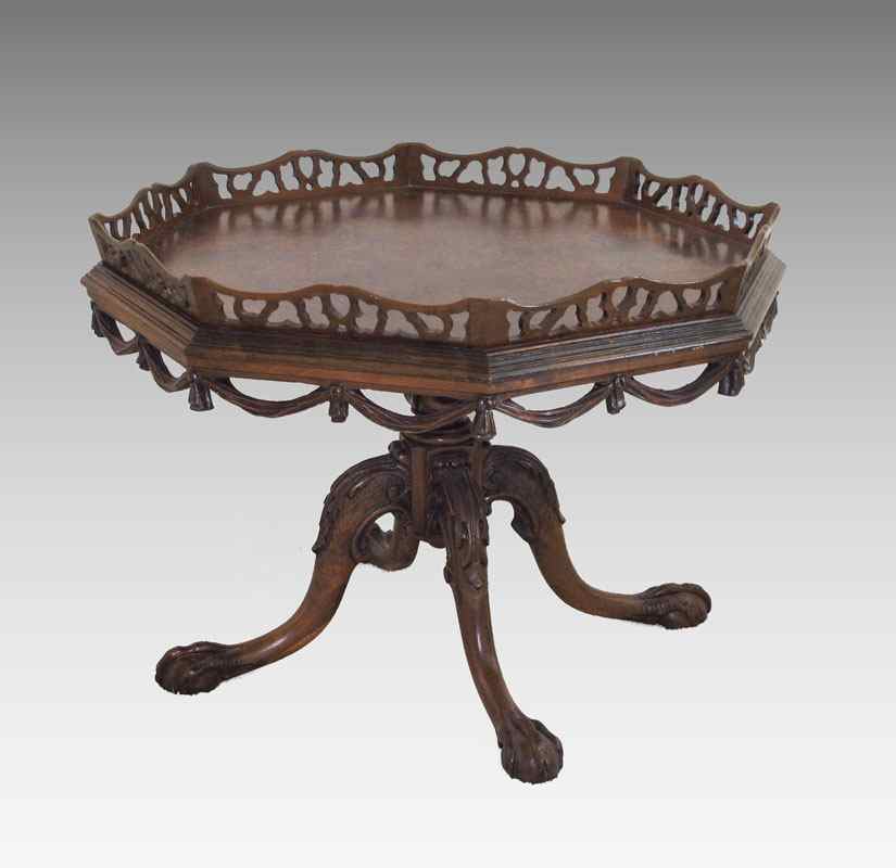 Appraisal: BALL AND CLAW BURLED TOP TABLE Carved gallery and apron