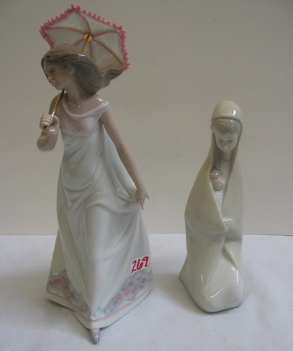 Appraisal: TWO SPANISH LLADRO GLAZED PORCELAIN FIGURES One a young lady