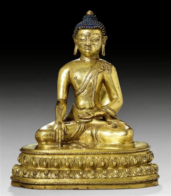 Appraisal: A GILT COPPER ALLOY FIGURE OF BUDDHA SHAKYAMUNI WITH A