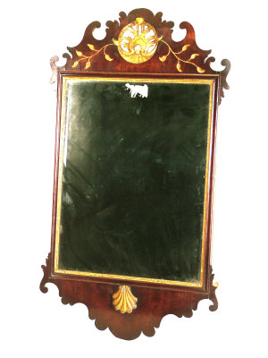 Appraisal: A mahogany and parcel gilt wall mirror circa the pierced