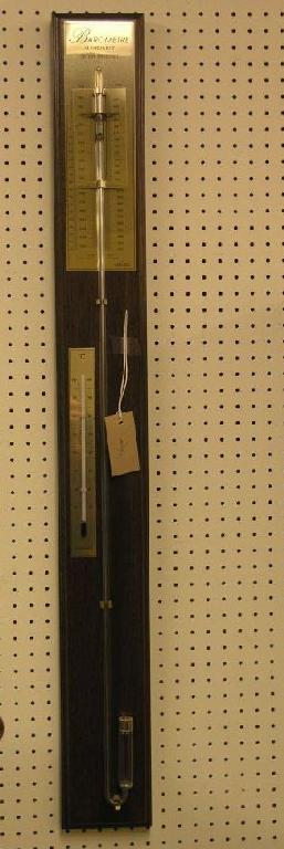 Appraisal: A French reproduction stick barometer with adjustable register plate ft