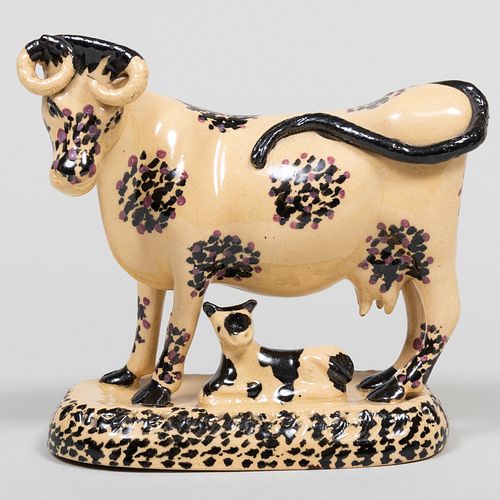 Appraisal: ENGLISH CREAMWARE COW GROUPUnmarked x x in Provenance Elizabeth S