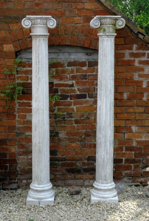 Appraisal: Pair of Italian Pillars scrolled capitals with egg and dart