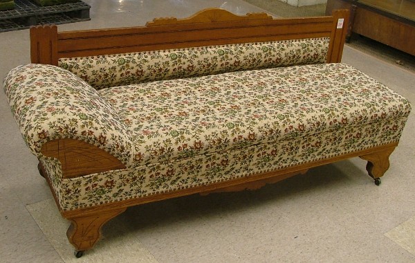 Appraisal: VICTORIAN OAK LOUNGE Eastlake style American c having a low