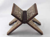 Appraisal: A folding wooden religious book support with grade silver facings