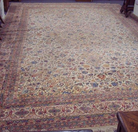 Appraisal: A large th Century Persian carpet flowers on a white