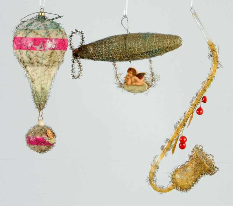 Appraisal: Lot of Large Wire-Wrapped Ornaments Description Includes one pipe one