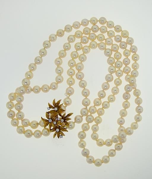 Appraisal: k yellow gold pearl and diamond double strand necklace k