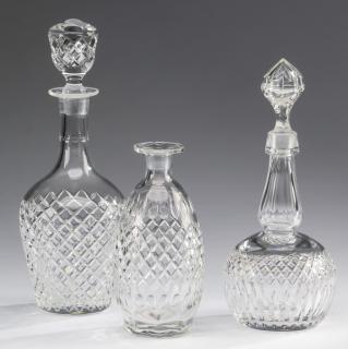 Appraisal: Cut crystal spirit decanters by Hawkes Three lobed cut crystal