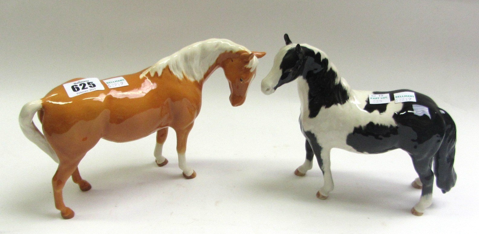 Appraisal: A Beswick piebald horse and a Beswick palomino horse