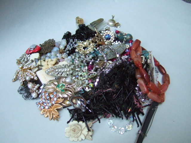 Appraisal: A collection of costume jewellery including necklaces brooch earrings beads