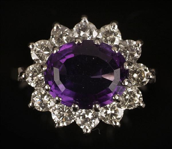 Appraisal: An amethyst and diamond cluster ring the central oval mixed