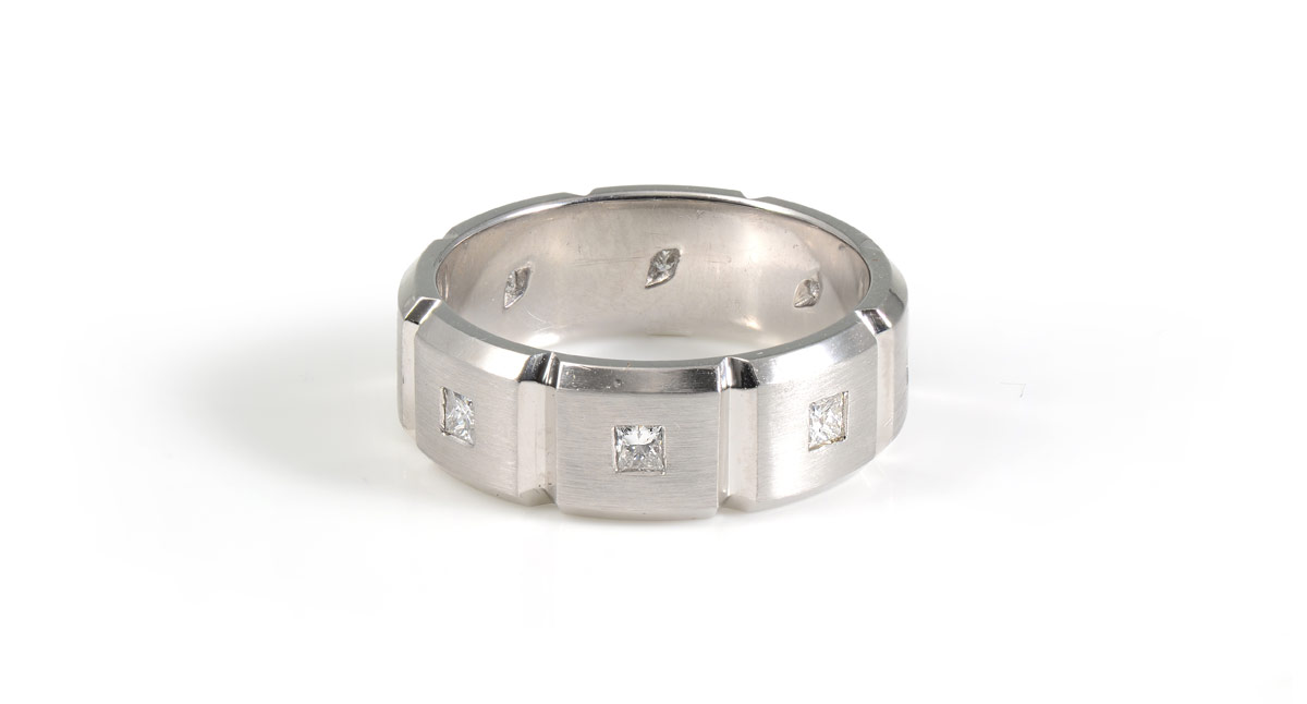 Appraisal: PLATINUM DIAMOND BAND RING Platinum in a brushed and polished