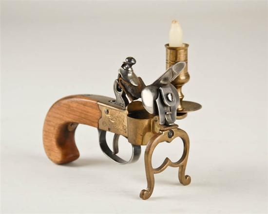 Appraisal: A Flintlock Pistol Candle Holder the wood grip and firing