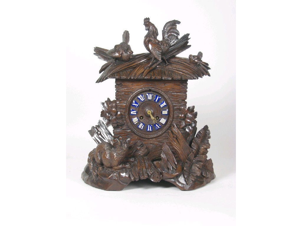 Appraisal: A Black Forest Mantel Clock profusely carved with cockerel hen