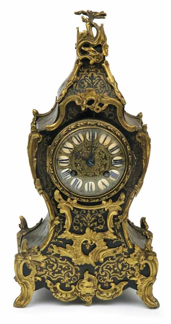 Appraisal: A French cut brass inlaid and ormolu salon clock Circa