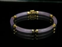 Appraisal: A Lavender Jade Bracelet K yellow gold tips and clasp