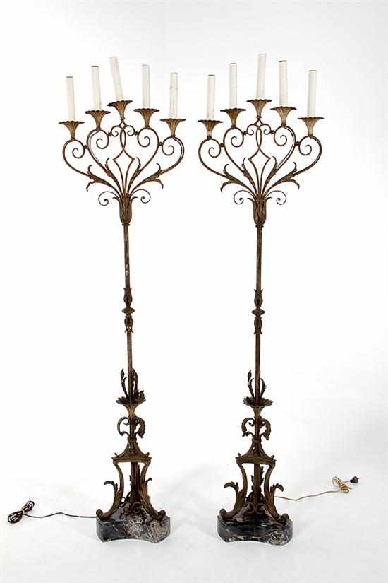 Appraisal: Pair wrought iron torcheres possibly Addison Mizner fan shaped five-light