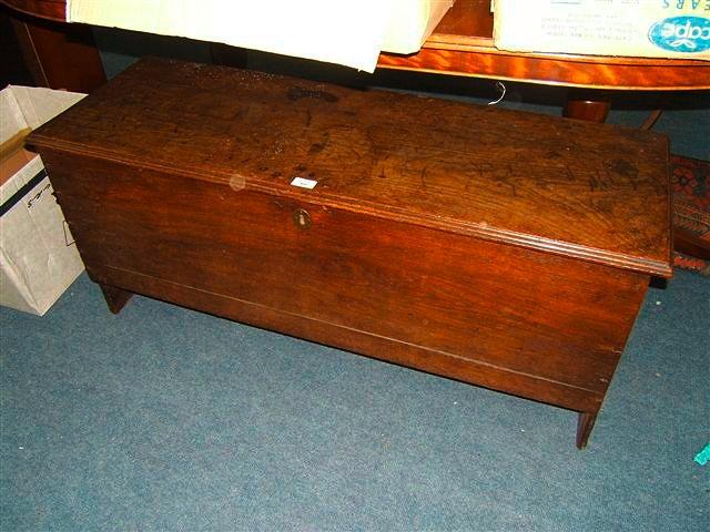 Appraisal: An antique oak six plank coffer wide