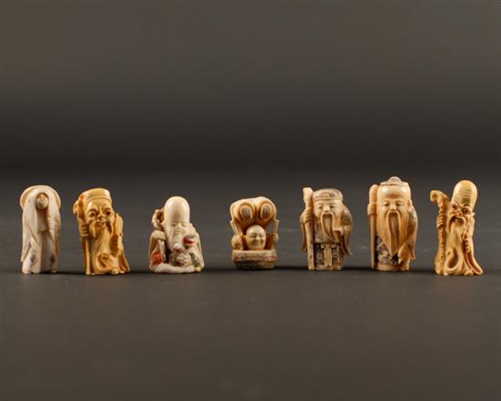 Appraisal: Seven Carved Small Figures most ivory five netsukes one of