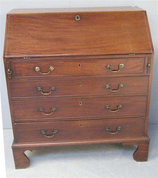 Appraisal: George III mahogany bureau with fitted interior above four long