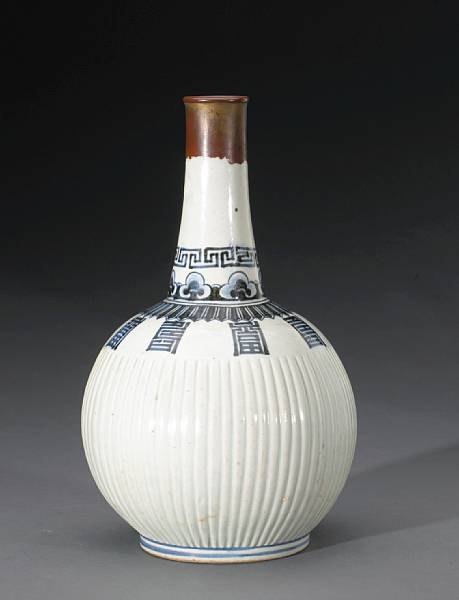 Appraisal: A blue and white porcelain bottle with auspicious character decoration