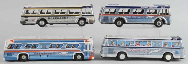 Appraisal: Lot of Tin Litho Greyhound Bus Friction Toys Description Japanese