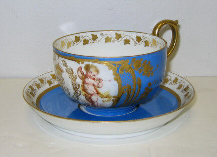 Appraisal: FRENCH SEVRES PORCELAIN CUP AND SAUCER Bleu Celeste ground the